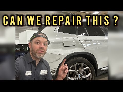 BMW quarter panel repair or replace ?