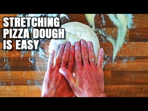 Stretching pizza dough PREVIEW