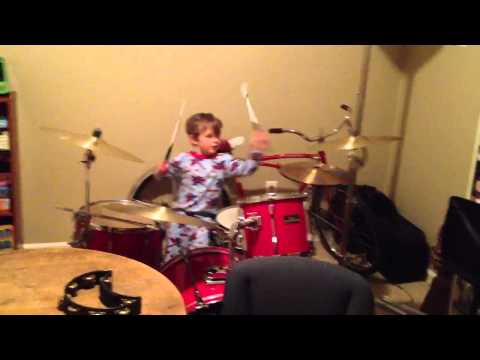 Charlie's first time on a drum set