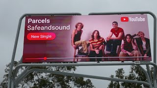 Parcels SafeandSound New Single YouTube Billboard Sunset Blvd Los Angeles California March 14, 2025